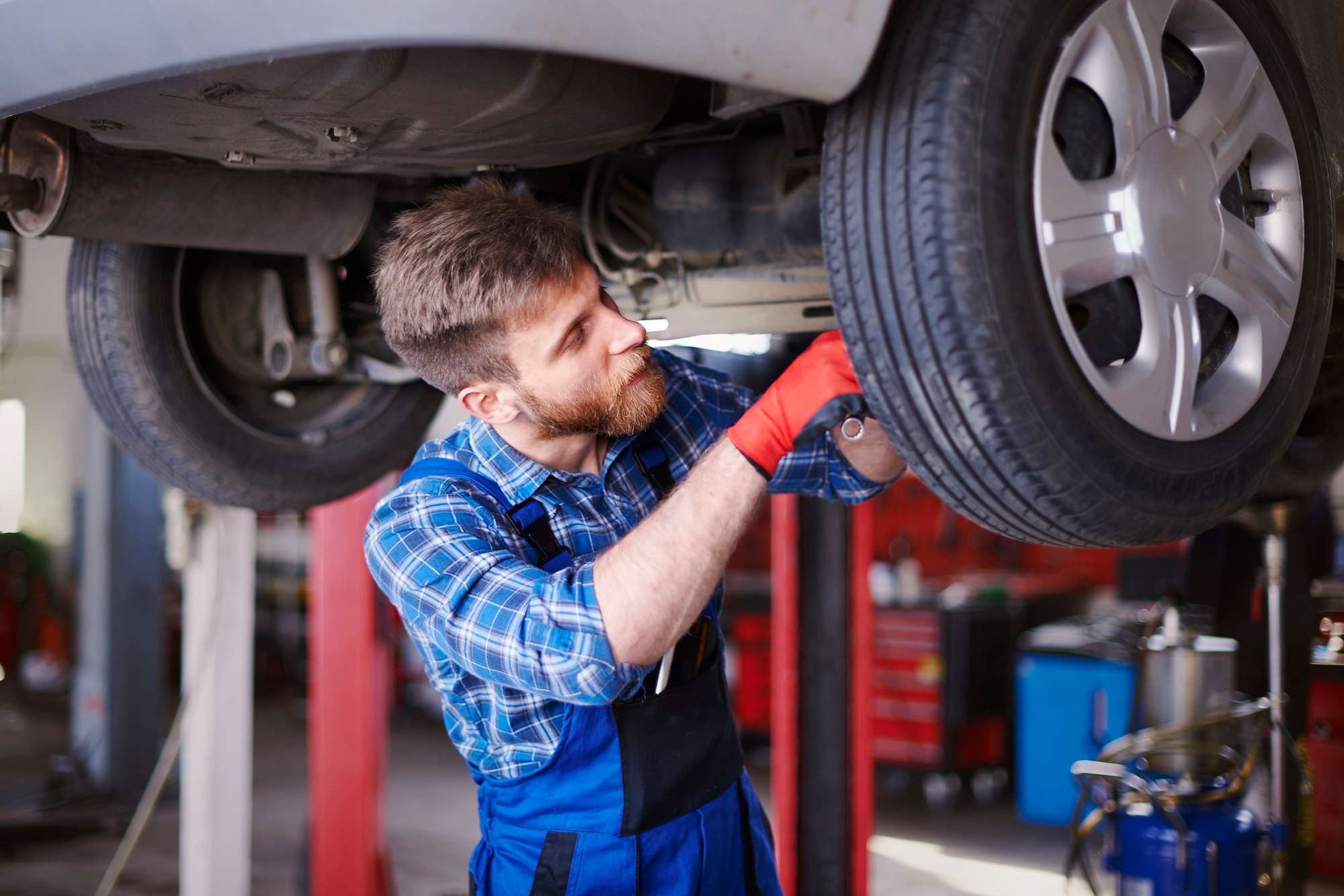 Mechanic conducting tire inspection