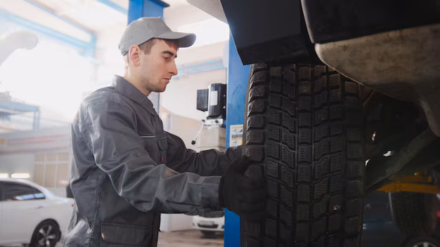 Mechanic working on tire repairs